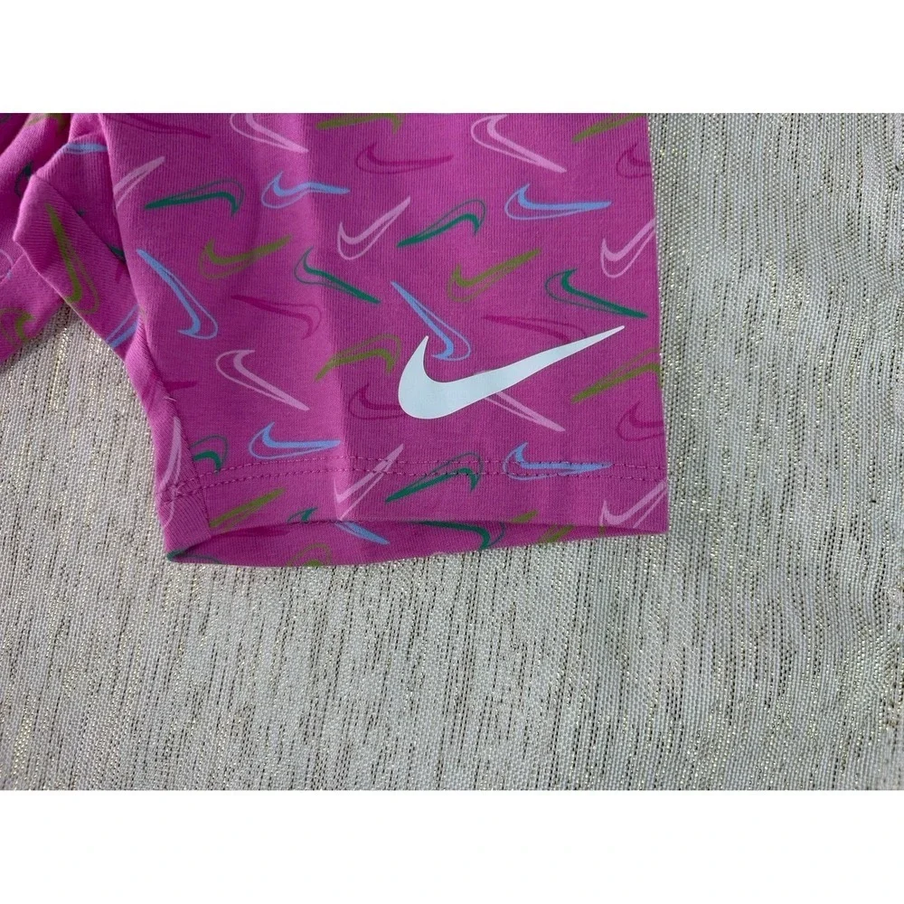Three pairs of pink Nike biker shorts, size 6X and 6